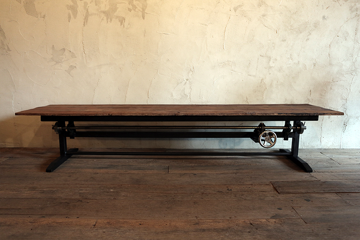 image of a long timber table with mechanical device, designed by vachira tongrow from his "if i were a carpenter" collection