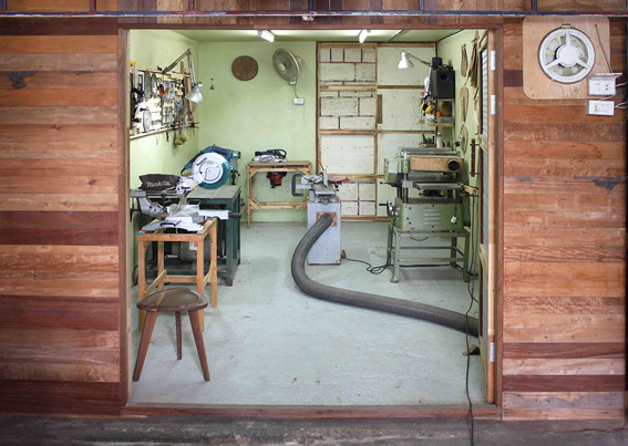 image of the craftsman Nu at work in his bangkok studio