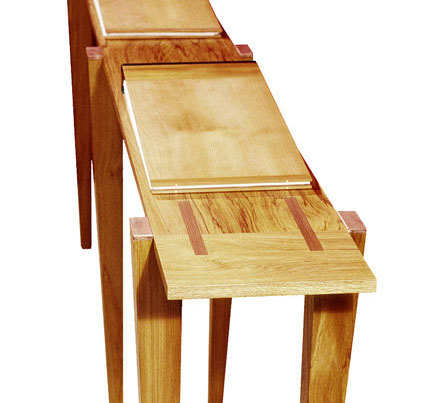 image of benovento designed timber six legged, insect like hall table, oak, rimu and redwood used in the design