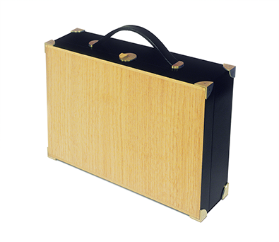 small beautiful handmade carry case made from english oak, brass with a leather handle and a black lacquer finish